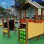 Omega Accessible Playground puidust ja värviliste mänguelementidega mänguväljak lastele.